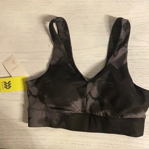 Never worn all in motion S Target bra with a twist in the back.